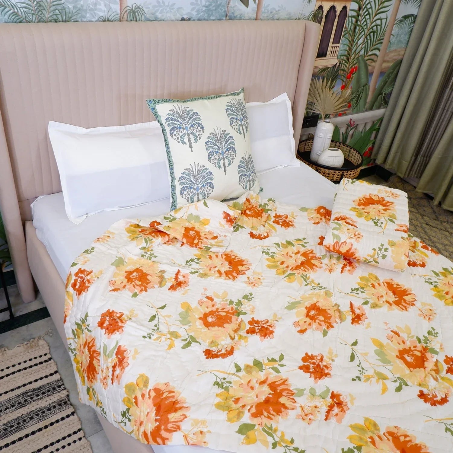 Stylish floral dohar on a bed showcasing the differences between dohar and quilt in design and texture
